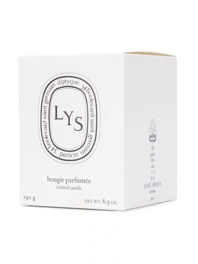 Shop Diptyque Lys Candle In White