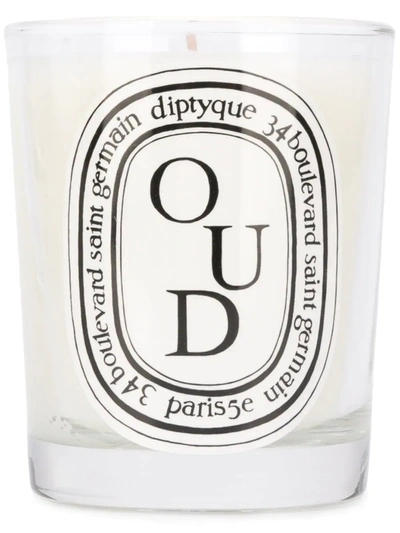 Shop Diptyque Oud Candle In White