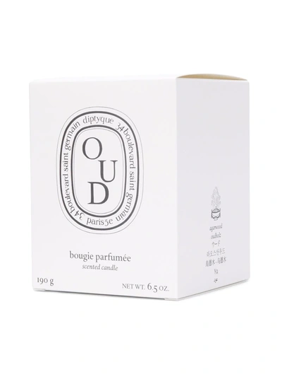 Shop Diptyque Oud Candle In White