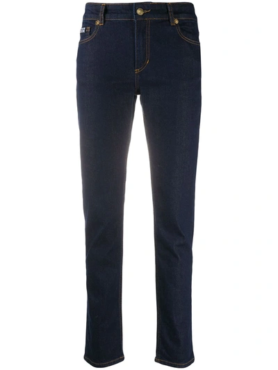 Shop Versace Jeans Couture Mid Rise Slim Jeans In Blue