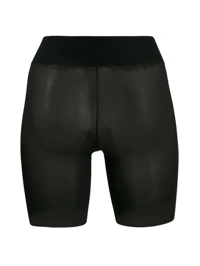 Shop Wolford Sheer Seamless Shorts In Black