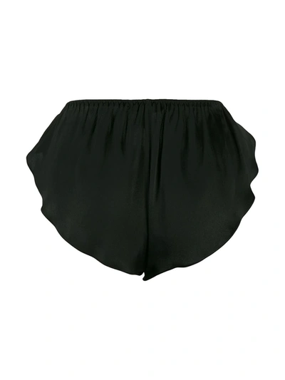 Shop Gilda & Pearl Gina Silk Tap Pants In Black