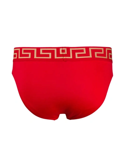 Shop Versace Greca Border Swim Briefs In Red