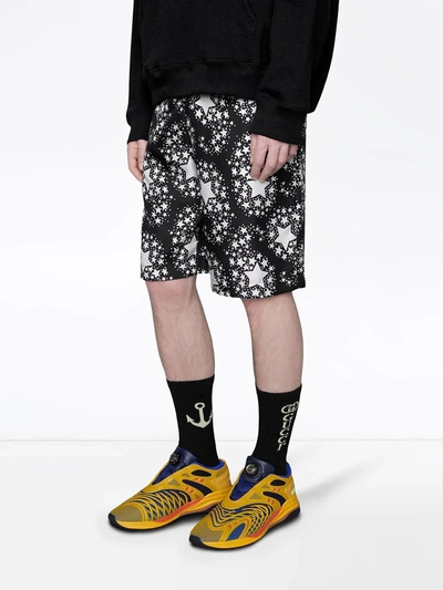 Shop Gucci Jacquard Lettering Logo Socks In Black