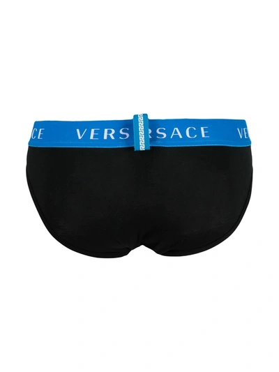 Shop Versace Logo-band Briefs In Black