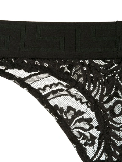 Shop Versace Floral Lace Thong In Black