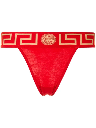 Shop Versace Greca Medusa Waistband Thong In Red