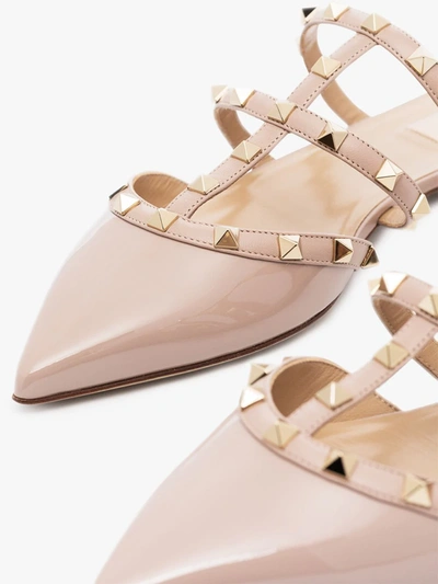 Shop Valentino Neutral Rockstud Patent Leather Mules In Neutrals