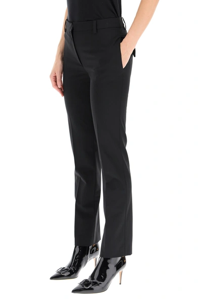 Shop Valentino Stretch Wool Trousers In Nero
