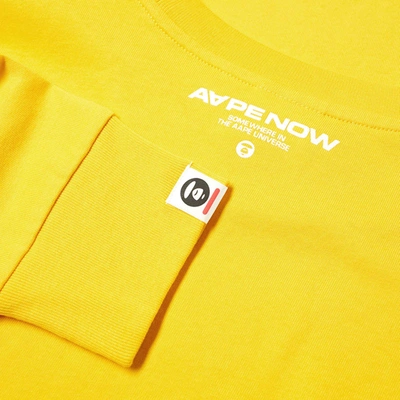 Shop Aape By A Bathing Ape Aape Long Sleeve Logo Arm Tee In Yellow