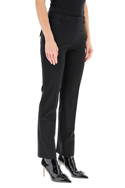 Shop Valentino Stretch Wool Trousers In Black