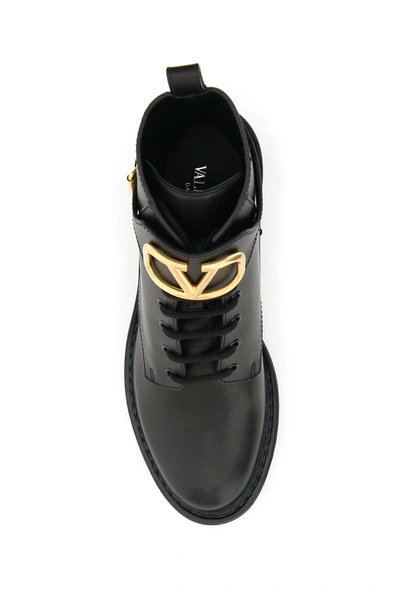 Shop Valentino Garavani Vlogo Combat Leather Boots In Nero