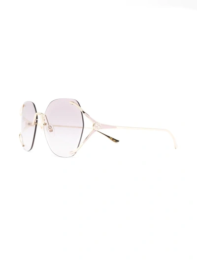 Shop Gucci Round-frame Sunglasses In Gold