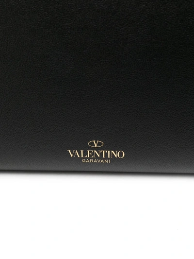 Shop Valentino Rockstud Clutch Bag In Black