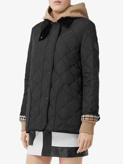 Shop Burberry Coats In Nero