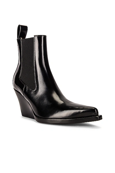 Shop Bottega Veneta The Lean Boots In Black