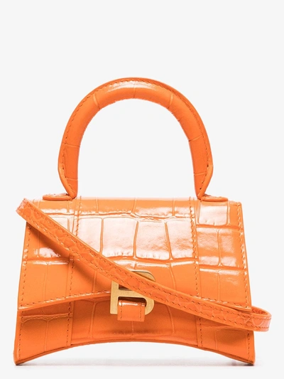 Shop Balenciaga 'hourglass' Mini-tasche In Orange