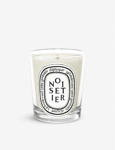 Shop Diptyque Noisetier Scented Candle In Na