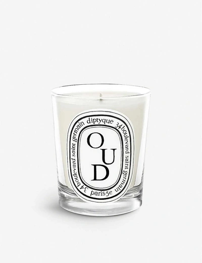 Shop Diptyque Oud Scented Candle In Na