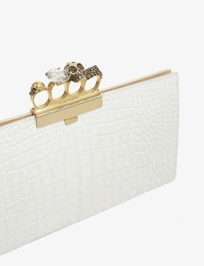 Shop Alexander Mcqueen Four-ring Croc-embossed Leather Clutch In Ivory