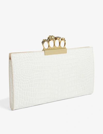 Shop Alexander Mcqueen Four-ring Croc-embossed Leather Clutch In Ivory