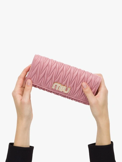 Shop Miu Miu Matelassé Leather Flap Wallet In Pink