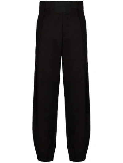 Shop Ferragamo Side-panel Tapered Trousers In Black