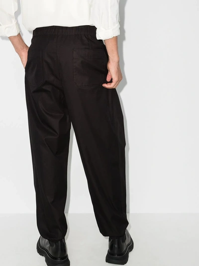 Shop Ferragamo Side-panel Tapered Trousers In Black