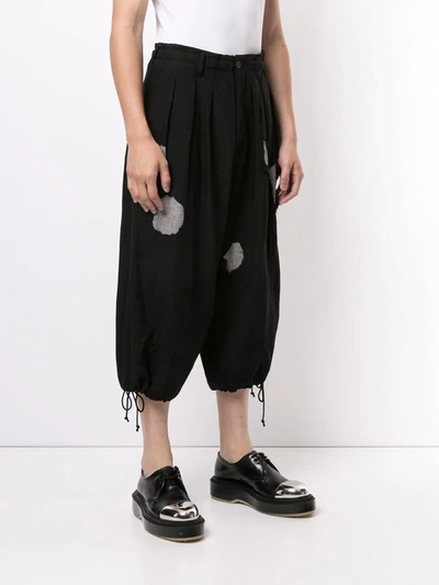 Shop Yohji Yamamoto Ripped-effect Cropped Trousers In Black