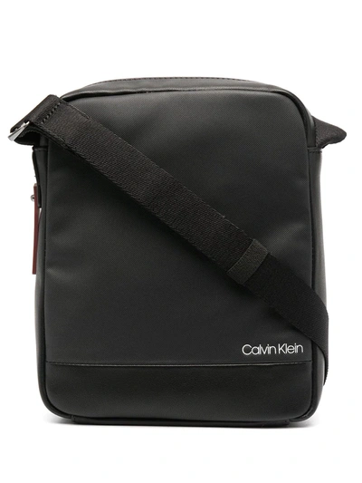 Shop Calvin Klein Logo Print Messenger Bag In Black