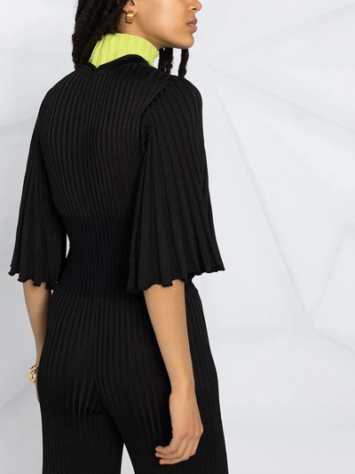 Shop Bottega Veneta Ruffled Pleated Jumpsuit In Black