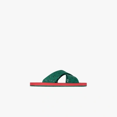 Shop Gucci And Red Gg Rubber Logo Sandals In Green