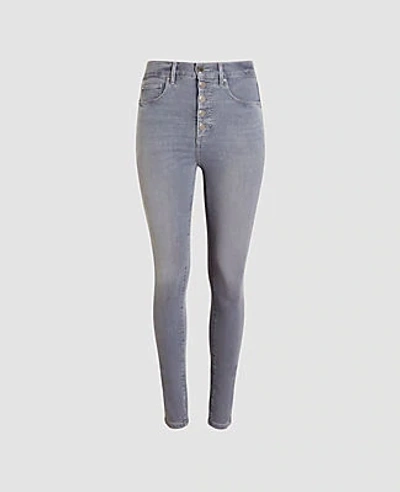 Shop Ann Taylor Petite Sculpting Pocket High Rise Skinny Jeans In Silver Grey Wash