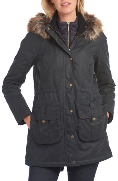 Shop Barbour Homeswood Waxed Cotton Hooded Raincoat With Faux Fur Trim In Navy/ Classic