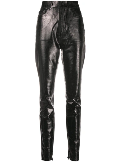 Shop Saint Laurent High-waisted Leather Effect Trousers In Black