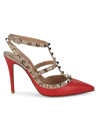 Shop Valentino Rockstud Leather Pumps In Red
