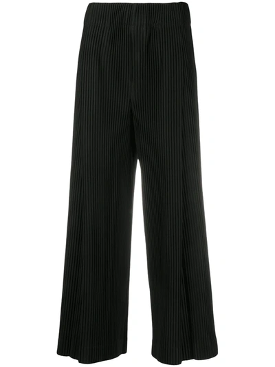 Shop Issey Miyake Plissé Wide-leg Trousers In Black