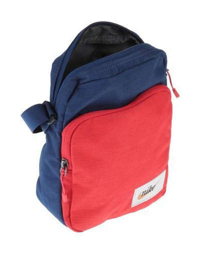 Shop Nike Handbags In Red