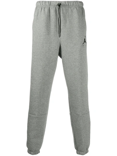 Shop Nike Logo Print Track Pants In Grey