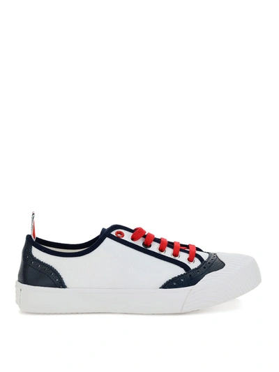 Shop Thom Browne Contrasting Piping Sneakers In White