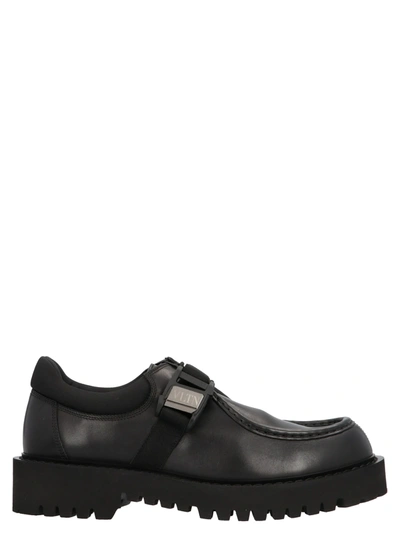Shop Valentino Vltn Shoes In Black