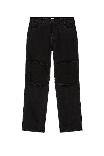 Shop Raf Simons Relaxed Fit Denim Pants With Cut Out Knee Patches In Black