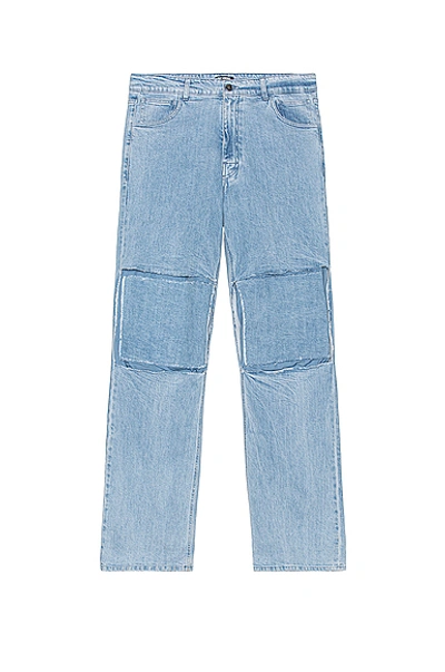 Shop Raf Simons Relaxed Fit Denim Pants With Cut Out Knee Patches In Very Light Blue