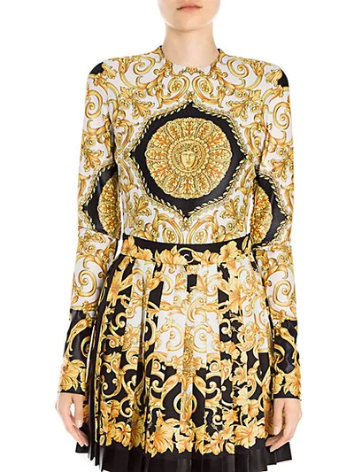 Shop Versace Long Sleeve Hibiscus Bodysuit In Black Gold