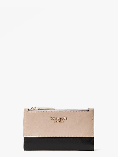 Shop Kate Spade Spencer Small Slim Bifold Wallet In Warm Beige/black