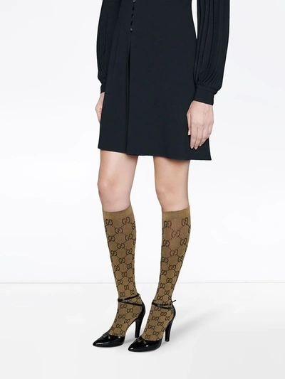 Shop Gucci Gg Pattern Knee-high Socks In Brown