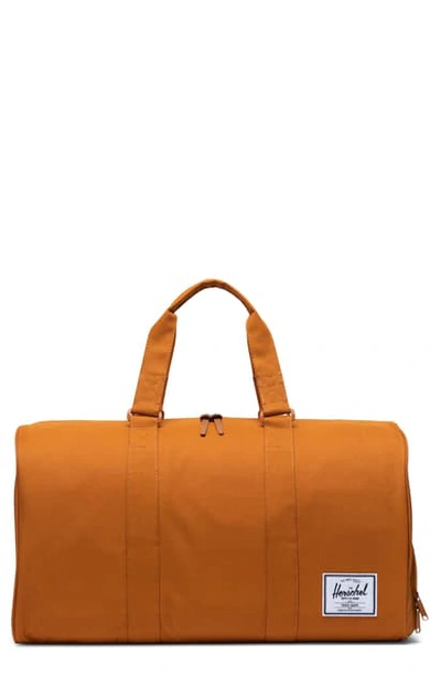 Shop Herschel Supply Co Novel Duffle Bag In Pumpkin Spice