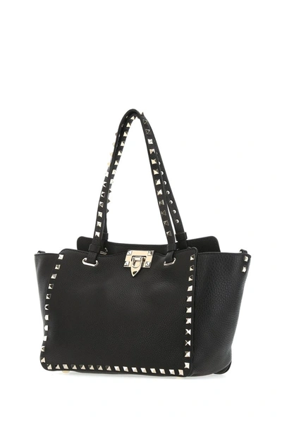 Shop Valentino Garvani Small Rockstud Tote Bag In Black