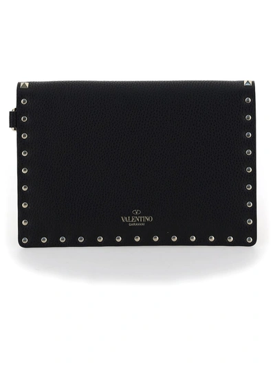 Shop Valentino Garavani Rockstud Medium Envelope Pouch Bag In Black