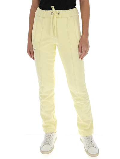 Shop Palm Angels Logo Embroidered Track Pants In Yellow